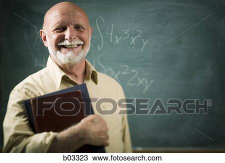 Portrait of a senior male professor standing in front of a blackboard View Large Photo Image Stock Image - Portrait of a senior male professor standing in front of a blackboard. Fotosearch