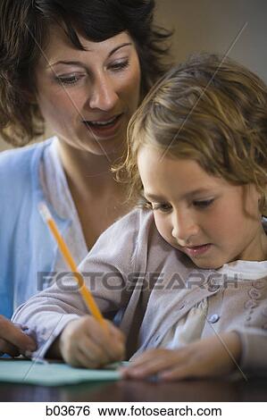 Stock Photograph - Portrait of a young woman smiling. Fotosearch