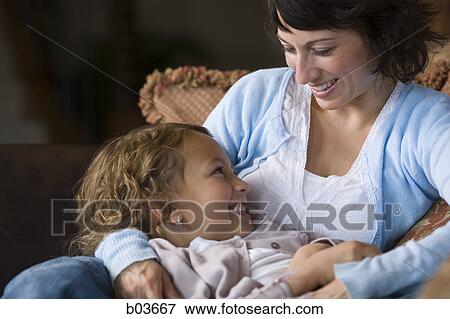 High angle view of a young couple sleeping in a hammock View Large Photo Image Stock Photo - High angle view of a young couple sleeping in a hammock. Fotosearch