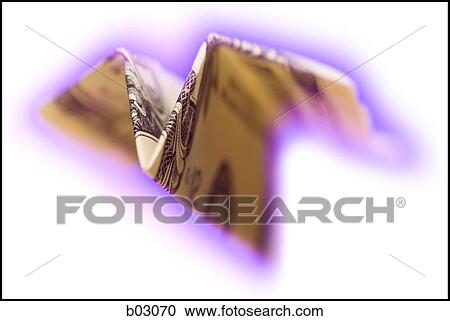 Close-up of a paper airplane made from a US dollar bill View Large Photo Image Stock Image - Close-up of a paper airplane made from a US dollar bill. Fotosearch