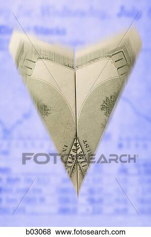 Close-up of a paper airplane made from a one hundred dollar bill View Large Photo Image Stock Photo - Close-up of a paper airplane made from a one hundred dollar bill. Fotosearch
