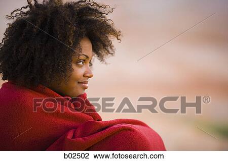 Profile of a young woman wrapped in towel View Large Photo Image Stock Image - Profile of a young woman wrapped in towel. Fotosearch