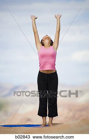 Young woman exercising View Large Photo Image Stock Image - Young woman exercising. Fotosearch