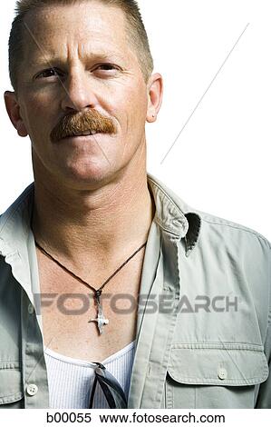 Close-up of a mature man smiling View Large Photo Image Stock Photography - Close-up of a mature man smiling. Fotosearch