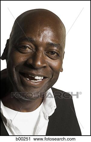 Portrait of a mature man smiling View Large Photo Image Stock Image - Portrait of a mature man smiling. Fotosearch