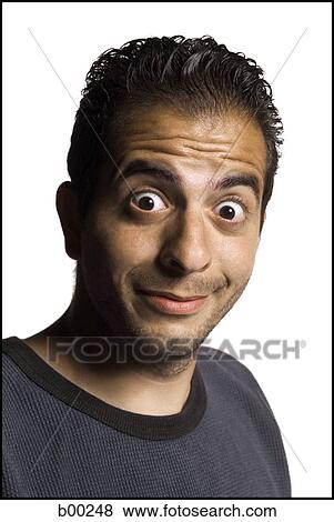 Portrait of a young man smiling View Large Photo Image Stock Photo - Portrait of a young man smiling. Fotosearch