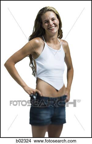 Portrait of a young woman smiling View Large Photo Image Picture - Portrait of a young woman smiling. Fotosearch