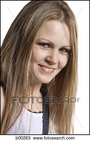 Stock Image - Portrait of a young woman smiling. Fotosearch