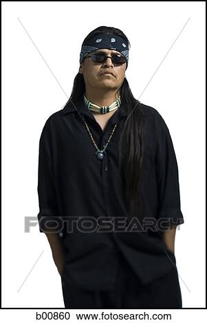 Stock Image - Portrait of an adult man with his hands in his pockets. Fotosearch