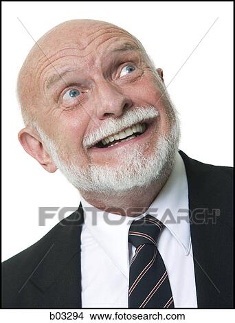 Close-up of a businessman smiling View Large Photo Image Picture - Close-up of a businessman smiling. Fotosearch