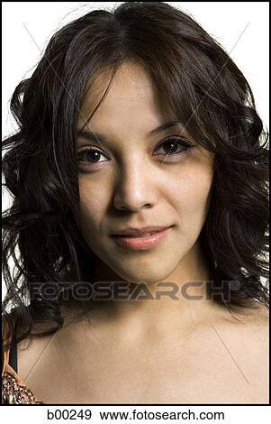 Stock Photo - Close-up of a young woman smiling. Fotosearch