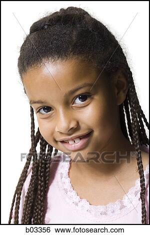 Stock Photograph - Portrait of a girl smiling. Fotosearch