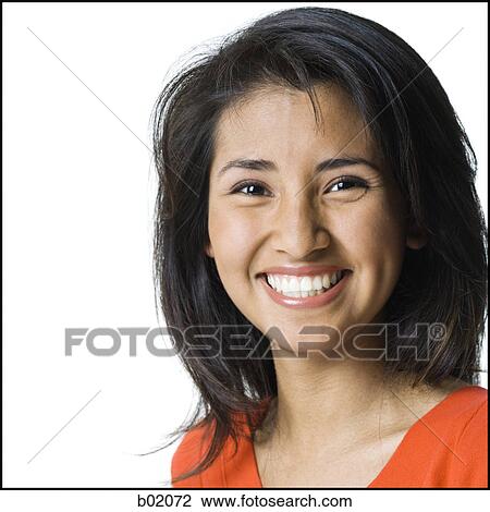 Stock Image - Portrait of a young woman smiling. Fotosearch