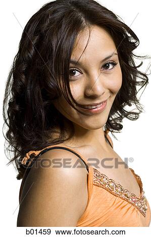Portrait of a young woman smiling View Large Photo Image Stock Photo - Portrait of a young woman smiling. Fotosearch