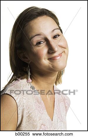 Portrait of a young woman smiling View Large Photo Image Stock Photography - Portrait of a young woman smiling. Fotosearch