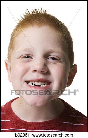 Stock Image - Young boy smiling in a portrait. Fotosearch