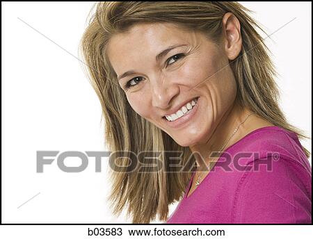 Young woman smiling View Large Photo Image Stock Image - Young woman smiling. Fotosearch