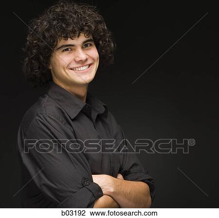 Close-up of a teenage boy smiling View Large Photo Image Stock Image - Close-up of a teenage boy smiling. Fotosearch