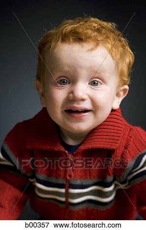 Stock Photo - Portrait of a baby boy smiling. Fotosearch