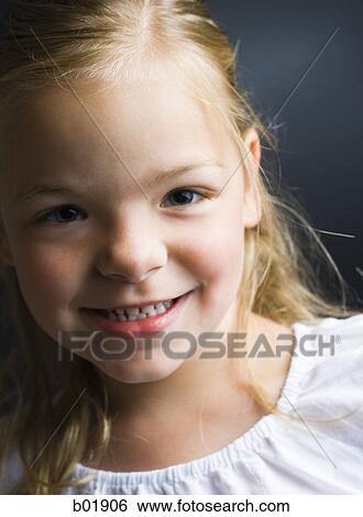 Portrait of a girl smiling View Large Photo Image Stock Photograph - Portrait of a girl smiling. Fotosearch