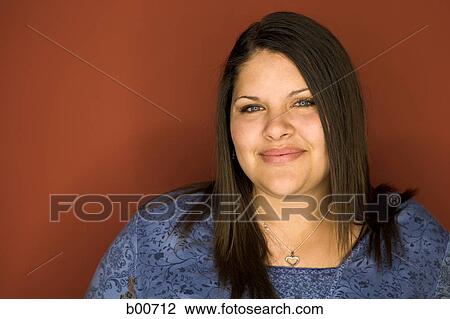Portrait of a teenage girl smiling View Large Photo Image Stock Image - Portrait of a teenage girl smiling. Fotosearch
