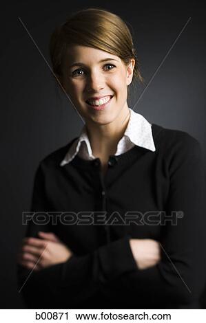 Portrait of a young woman smiling View Large Photo Image Stock Image - Portrait of a young woman smiling. Fotosearch