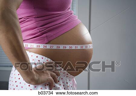 Close-up of a young woman View Large Photo Image Picture - Close-up of a young woman. Fotosearch