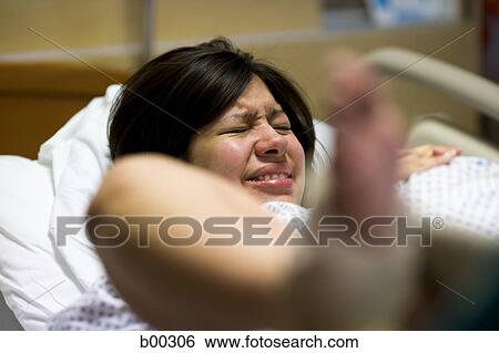 Female patient in labor View Large Photo Image Stock Photograph - Female patient in labor. Fotosearch