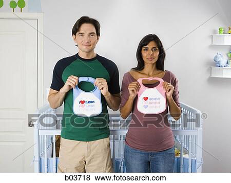 Portrait of a young woman biting a piece of watermelon View Large Photo Image Stock Photo - Portrait of a young woman biting a piece of watermelon. Fotosearch