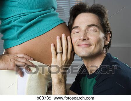 Portrait of a young woman with her mouth open View Large Photo Image Stock Photography - Portrait of a young woman with her mouth open. Fotosearch