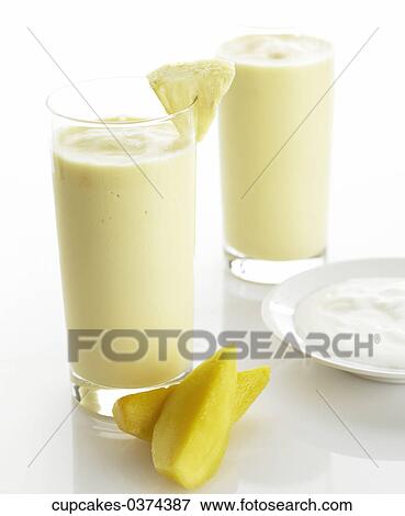 Stock Photo - Banana, Smoothie, Pineapple, Plate, White, Yellow, Mango. Fotosearch