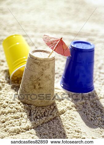 Beach, Outside, Still Life, Summer, Umbrella, Miniature Umbrella, Sunlight View Large Photo Image Stock Photo - Beach, Outside, Still Life, Summer, Umbrella, Miniature Umbrella, Sunlight. Fotosearch