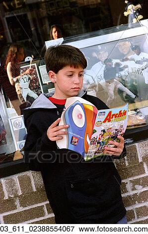 Boy, Child, Comics, Comic Book, Reading, Autumn View Large Photo Image Stock Photo - Boy, Child, Comics, Comic Book, Reading, Autumn. Fotosearch