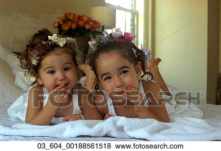 Child, At Home, Sisters, Siblings, Flowers, Happy, Ring Bearers View Large Photo Image Stock Photo - Child, At Home, Sisters, Siblings, Flowers, Happy, Ring Bearers. Fotosearch
