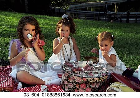 Child, Girl, Outside, Spring, Tea Party, Tea, Pretend View Large Photo Image Picture - Child, Girl, Outside, Spring, Tea Party, Tea, Pretend. Fotosearch