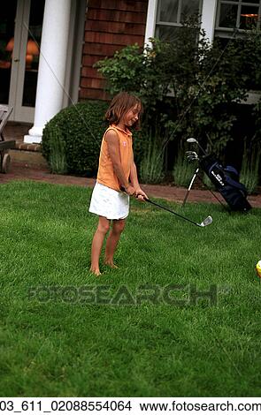 Child, Outside, Sport, Girl, Golf, Playing View Large Photo Image Picture - Child, Outside, Sport, Girl, Golf, Playing. Fotosearch
