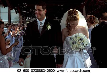 Couple, Wedding, Bride, Groom, Walking, Aisle, Applause View Large Photo Image Stock Image - Couple, Wedding, Bride, Groom, Walking, Aisle, Applause. Fotosearch