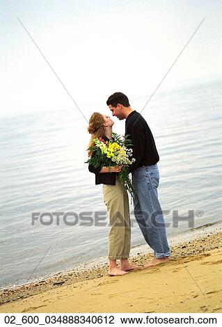 Stock Image - Couple, Woman, Romantic, Affection. Fotosearch