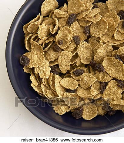 Stock Photograph - Food, Dry, Cereal, Raisin Bran, Black Bowl. Fotosearch