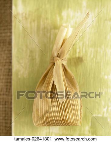 Stock Image - Food, Tamale, Mexican, Corn Husk. Fotosearch