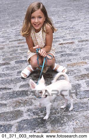 Stock Image - Girl, Outside, Spring, Summer, Dog, Animal, Pet. Fotosearch