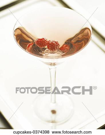 Stock Photo - Martini Glass, Raspberries, Red, Many, Fruit, Cocktail. Fotosearch
