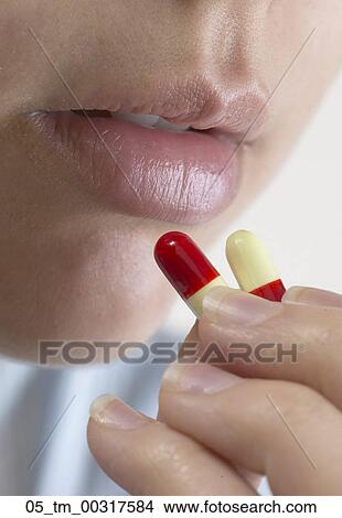 Medical, Woman, Still Life, Mouth, Medication, Pills, Medicine View Large Photo Image Picture - Medical, Woman, Still Life, Mouth, Medication, Pills, Medicine. Fotosearch