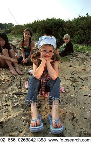 Stock Photo - Outside, Child, Beach, Sand, Flip Flops. Fotosearch