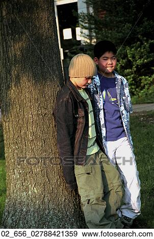 Outside, Child, Bully, Hat, Boy, Boys, Friends View Large Photo Image Stock Photo - Outside, Child, Bully, Hat, Boy, Boys, Friends. Fotosearch