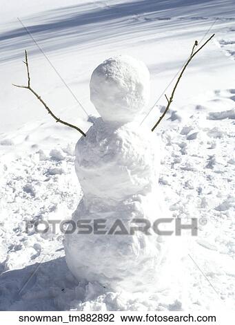 Stock Image - Outside, Snow, Winter, Snowy, Snowman, Branches. Fotosearch
