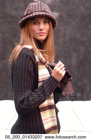 Stock Photo - Outside, Woman, Winter, Portrait, Trendy. Fotosearch