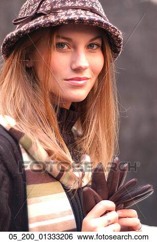 Stock Photograph - Outside, Woman, Winter, Portrait, Trendy. Fotosearch