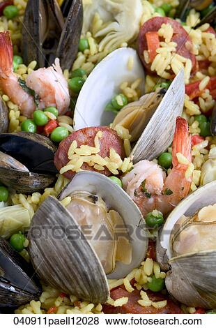 Stock Photo - Paella, Still Life, Food, Rice, Shrimp, Clams, Sausage. Fotosearch
