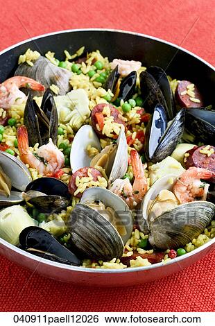 Stock Photograph - Paella, Still Life, Food, Shrimp, Clams, Rice, Sausage. Fotosearch
